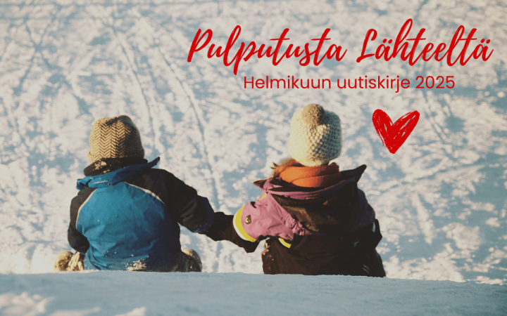 Kuvassa kaksi lasta lumessa ja sydän