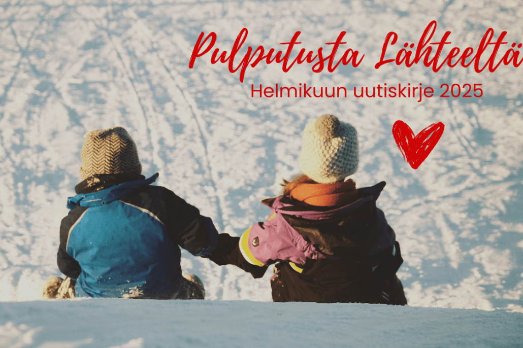 Kuvassa kaksi lasta lumessa ja sydän