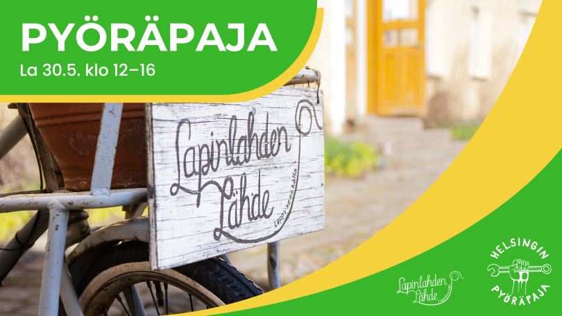 Lapinlahden Lähde -kyltti ja pyörä rakennuksen pihalla.